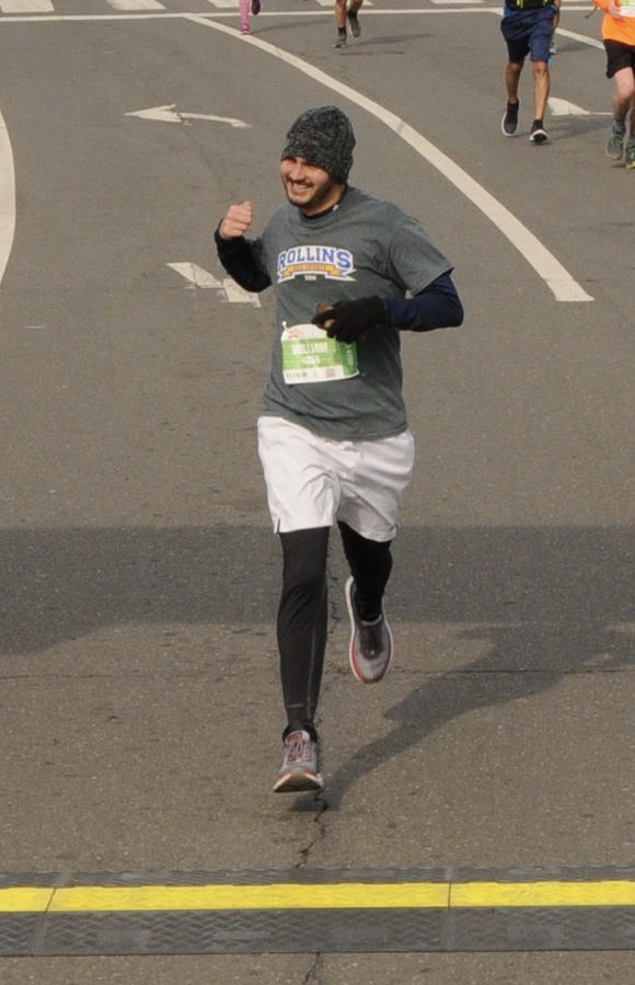Financial Glass - Crossing the finish line to complete my first marathon at the 2018 Philadelphia Marathon